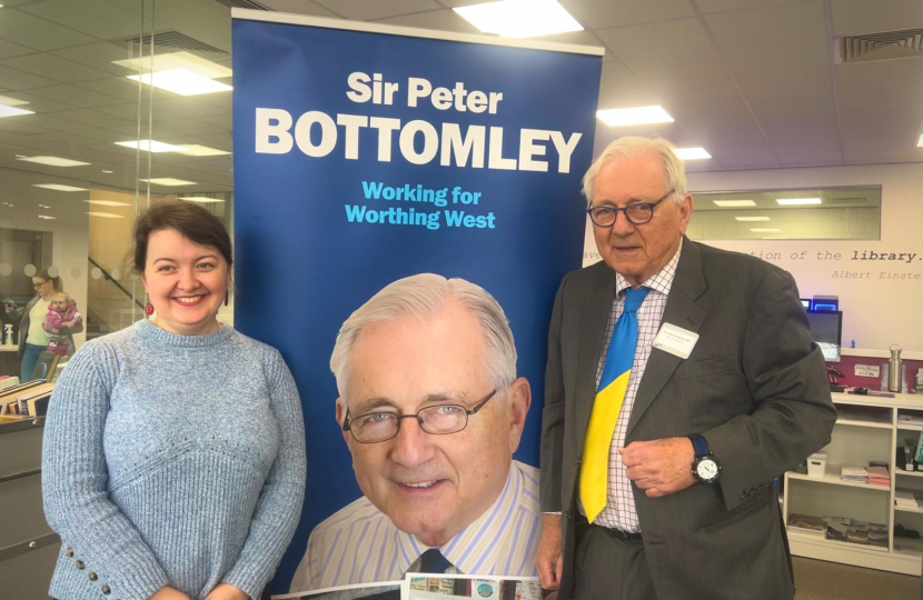 Sir Peter Bottomley with a constituent at a surgery