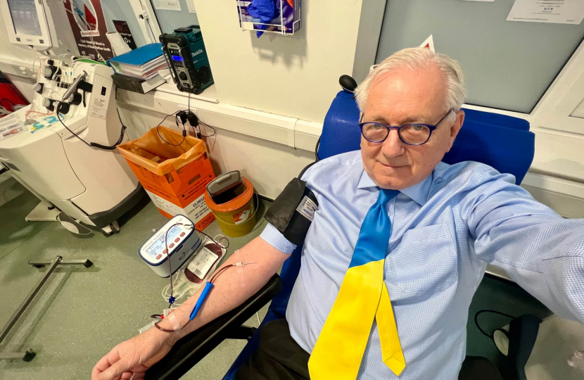 Sir Peter Bottomley donating blood