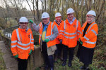 Sir Peter Bottomley with a team of sewage workers